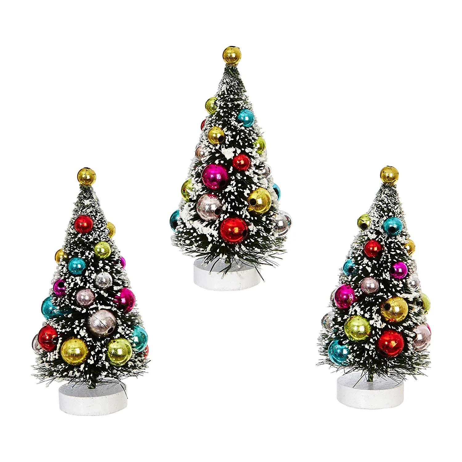 Three small decorated bottle brush trees with glass ball ornaments and snowy branches on white wooden bases