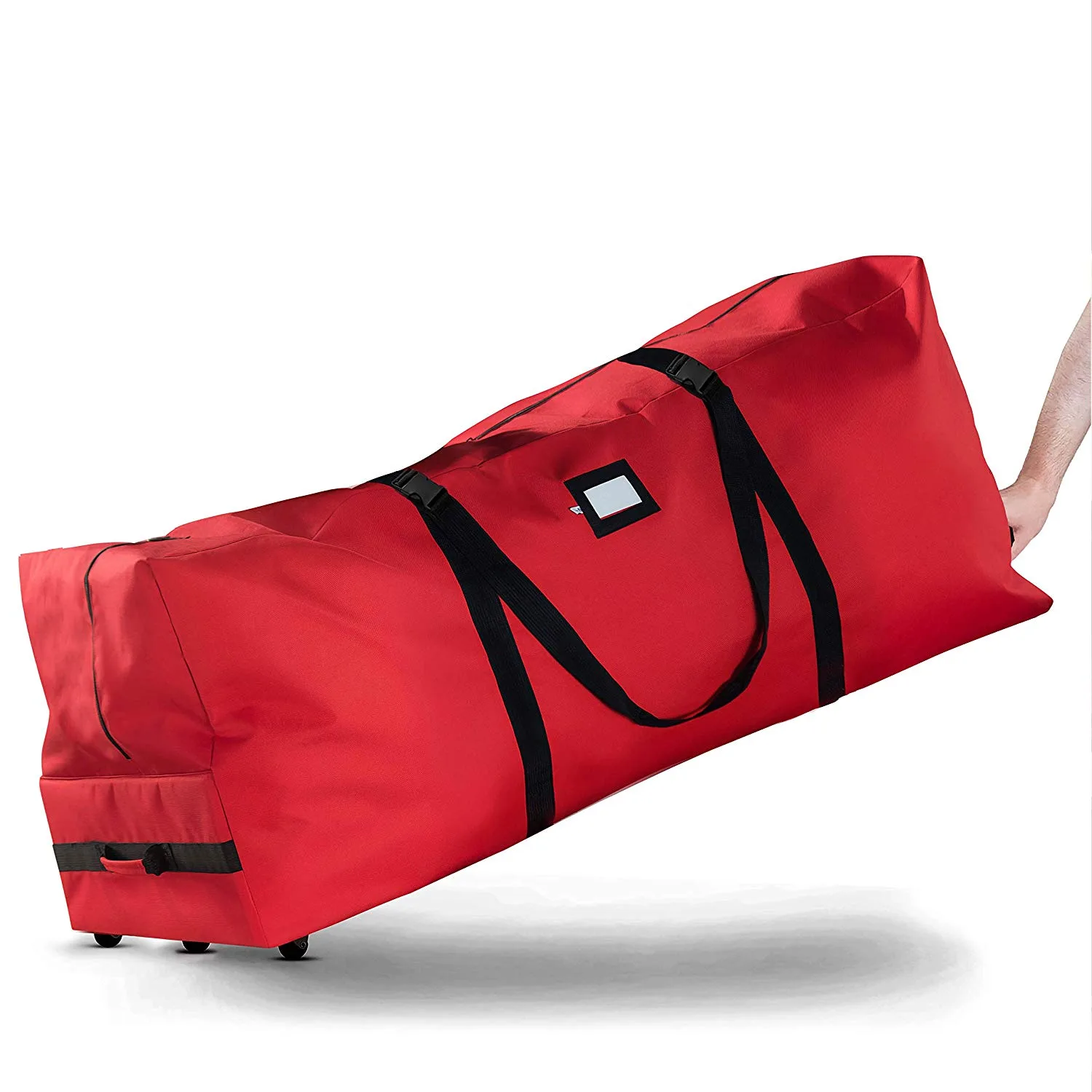 A large red rolling Christmas tree storage bag with black straps, carry handles, a label window and wheels